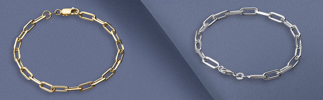 2 lightweight sterling silver paper chain bracelets on a blue background. The bracelet has been plated with 9ct yellow gold.